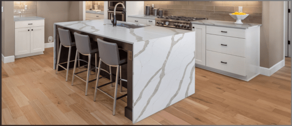 White quartz with warm tones that go well with any kitchen